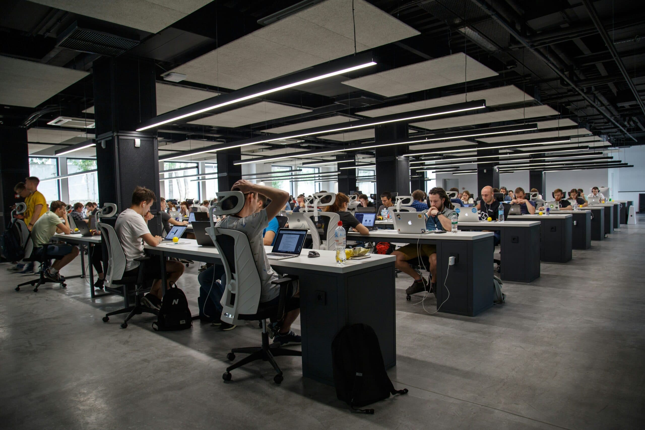 A collaborative technology team working in a modern studio